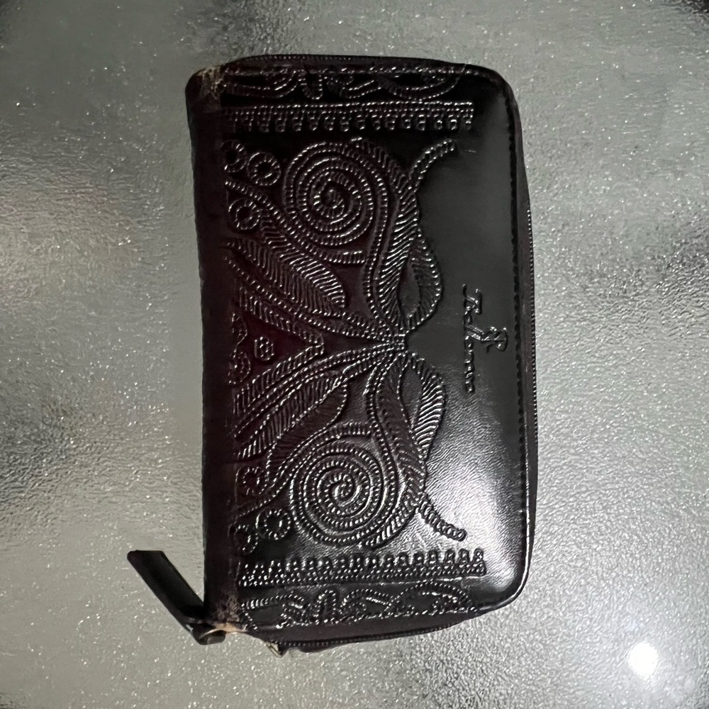Belle Rose black leather wallet with unique design, featuring card slots pockets